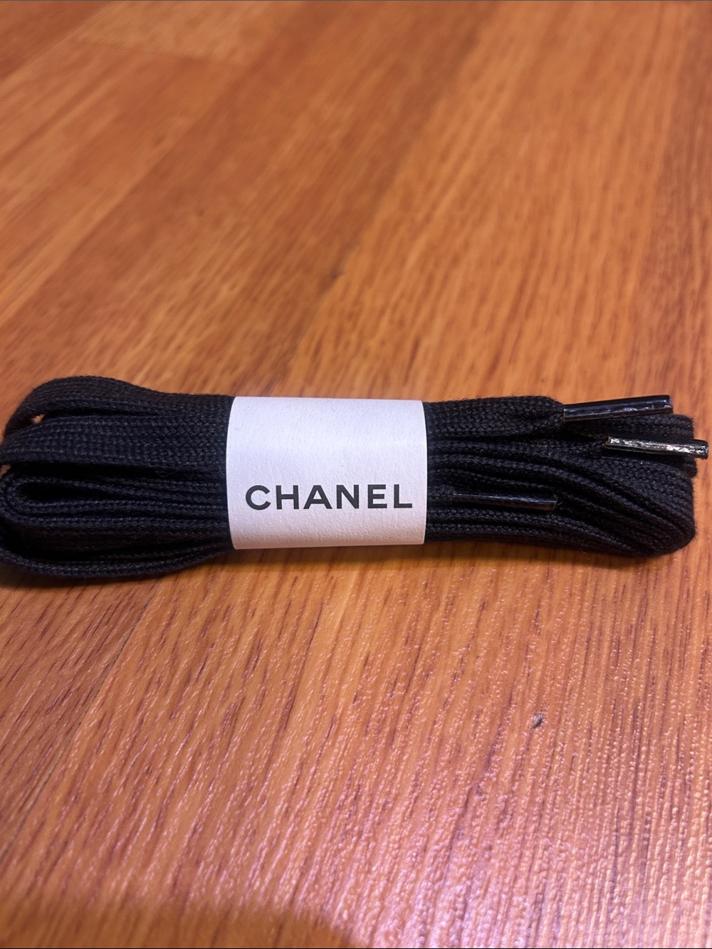 CHANEL Black Branded Shoelaces with Silver Aglets
